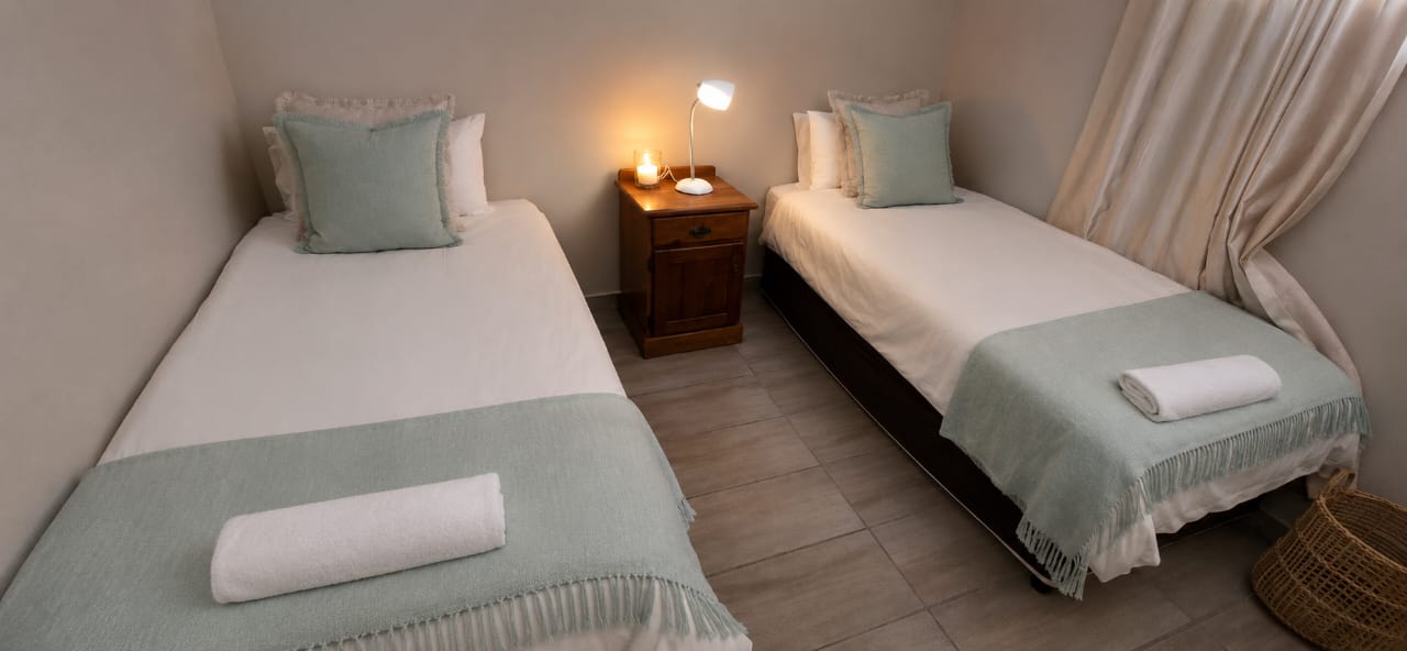 Twin bedroom, made up with fresh linen